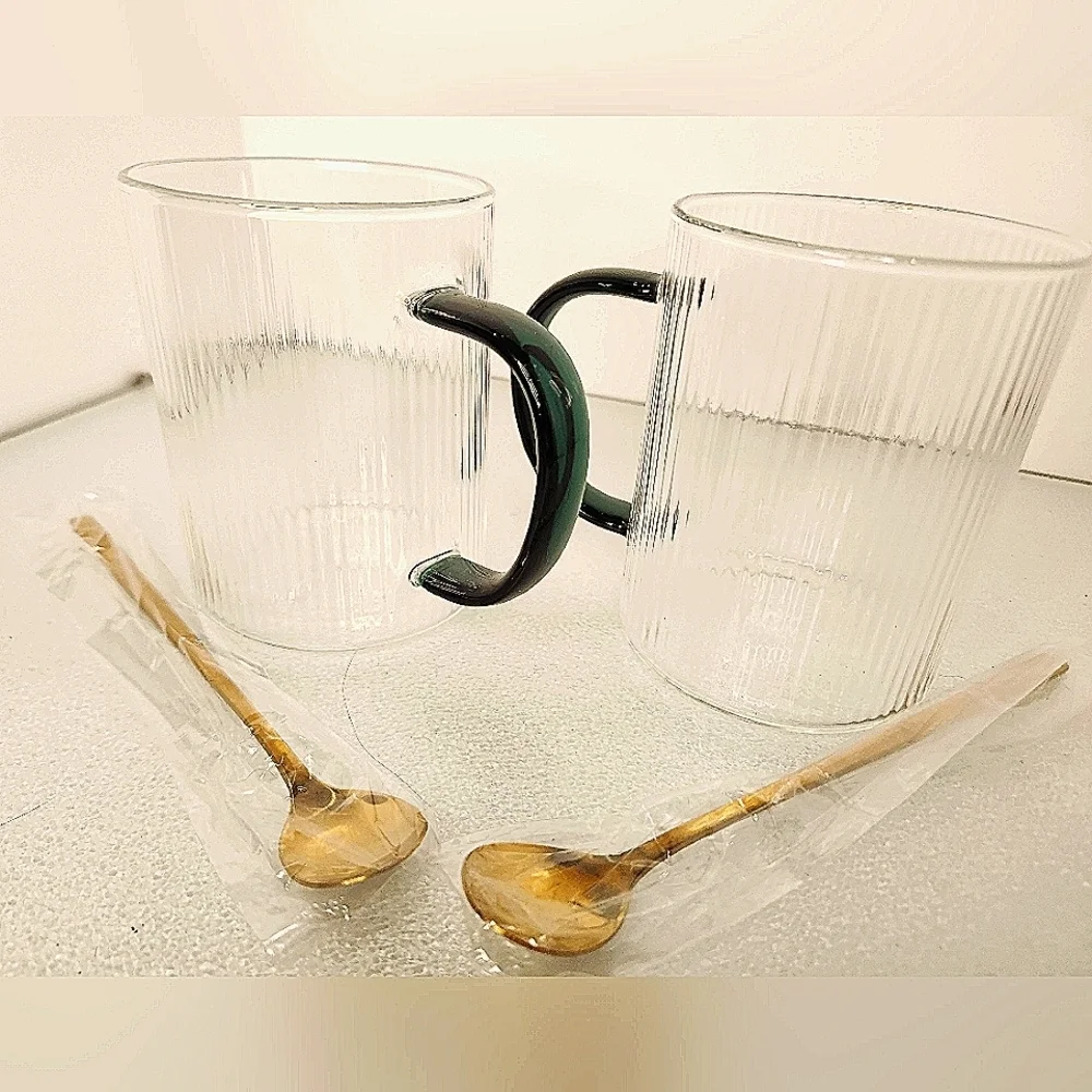 Lot 2 heat resistant clear and green‎ glass coffee/tea cups w gold stir spoons